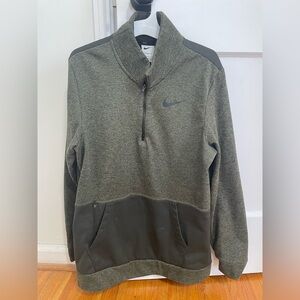 Nike 1/4 zip with kangaroo pouch pocket. Mens size small.